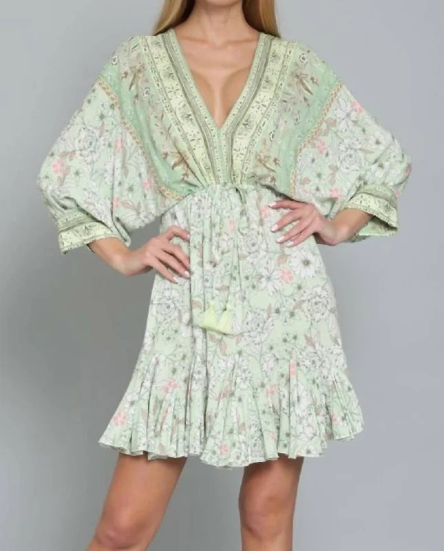 Hot Styles Dolman Sleeve Tie Front Waist Border Print Mini Dress In Pale Green Multi